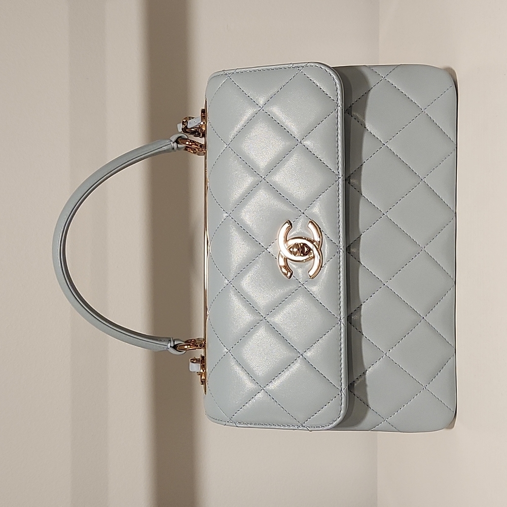 Chanel flap bag with top handle